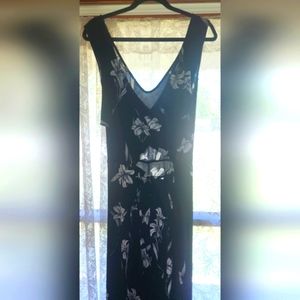 Stretchy summer jumpsuit with criss-cross back size XL with waist tie